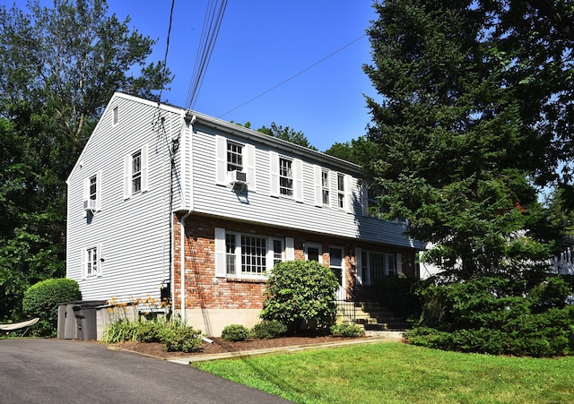 84 Parade Hill Rd Unit 84, New Canaan, CT 06840 - colonial home with brick siding and a front lawn