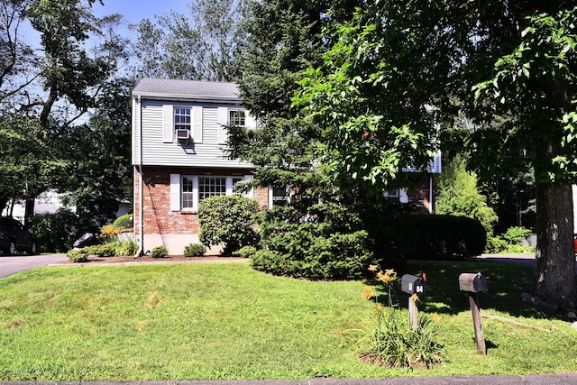 84 Parade Hill Rd Unit 84, New Canaan, CT 06840 - view of front facade featuring brick siding and a front lawn