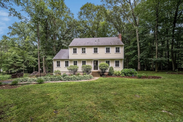 310 Opening Hill Rd, Madison, CT 06443 - colonial inspired home featuring a chimney and a front yard