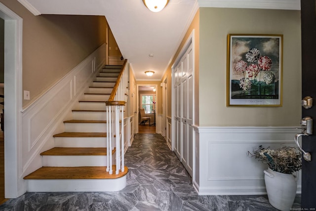 310 Opening Hill Rd, Madison, CT 06443 - stairs featuring a decorative wall, a wainscoted wall, and ornamental molding