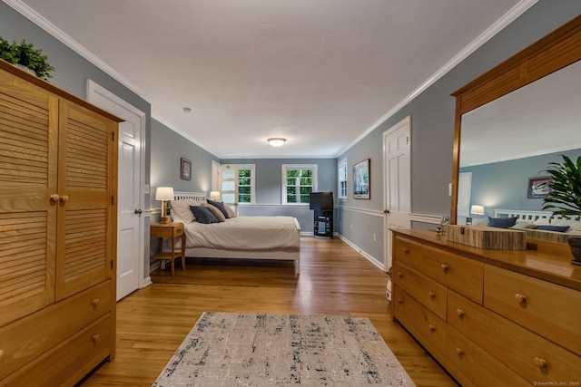 310 Opening Hill Rd, Madison, CT 06443 - bedroom with ornamental molding and light wood-style floors