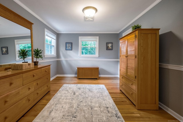 310 Opening Hill Rd, Madison, CT 06443 - bedroom featuring light wood-type flooring and crown molding
