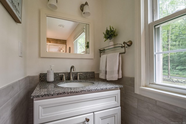 310 Opening Hill Rd, Madison, CT 06443 - bathroom with tile walls, vanity, and wainscoting