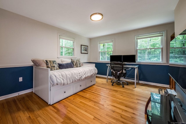 310 Opening Hill Rd, Madison, CT 06443 - bedroom with light wood-style floors and an office area