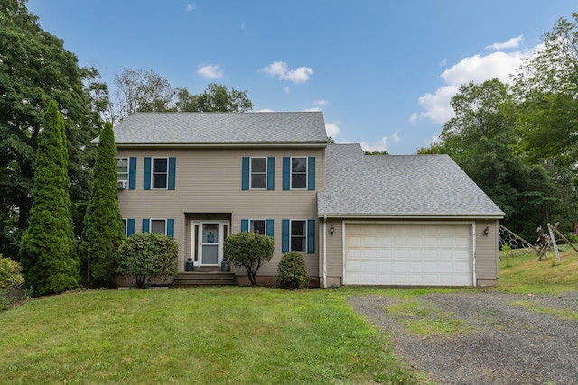 4 Overlook Dr, North Branford, CT 06471 - colonial home featuring gravel driveway, an attached garage, a front yard, and a shingled roof