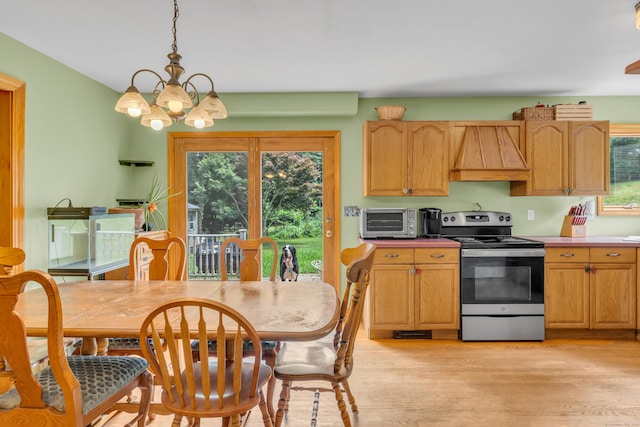 4 Overlook Dr, North Branford, CT 06471 - kitchen featuring electric stove, custom range hood, a chandelier, light wood-type flooring, and pendant lighting
