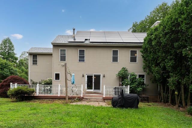4 Overlook Dr, North Branford, CT 06471 - back of house featuring a yard, solar panels, and a deck