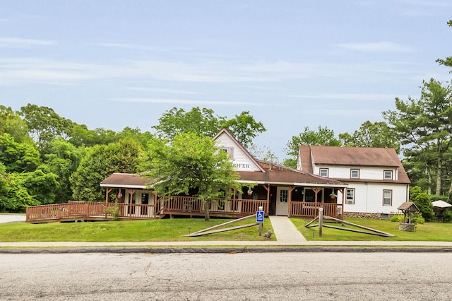678 Colonel Ledyard Hwy, Ledyard, CT 06339 - view of front facade with a porch and a front lawn