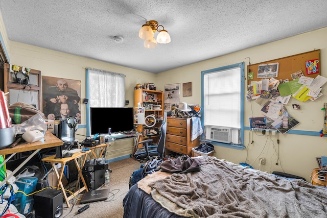 678 Colonel Ledyard Hwy, Ledyard, CT 06339 - bedroom with carpet floors, multiple windows, a textured ceiling, cooling unit, and an office area