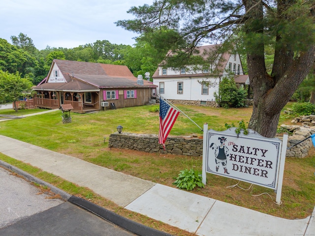 678 Colonel Ledyard Hwy, Ledyard, CT 06339 - view of front of property featuring a porch and a front lawn