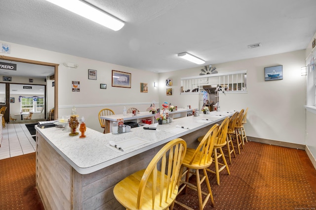678 Colonel Ledyard Hwy, Ledyard, CT 06339 - kitchen with a kitchen breakfast bar and a peninsula