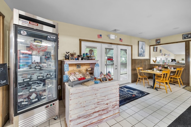 678 Colonel Ledyard Hwy, Ledyard, CT 06339 - kitchen with french doors and tile patterned floors