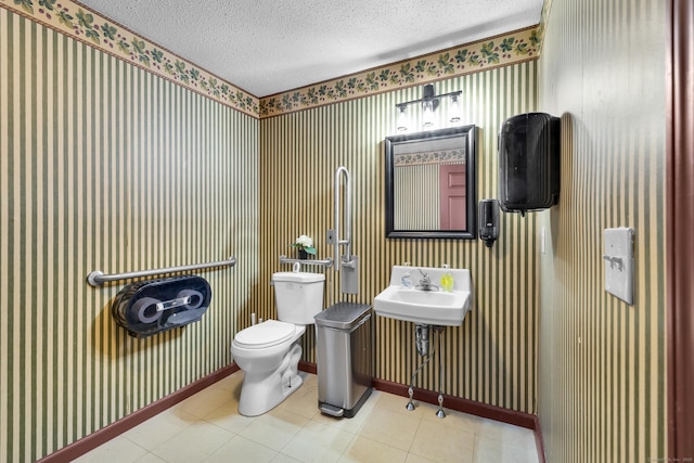 678 Colonel Ledyard Hwy, Ledyard, CT 06339 - bathroom featuring a textured ceiling and wallpapered walls