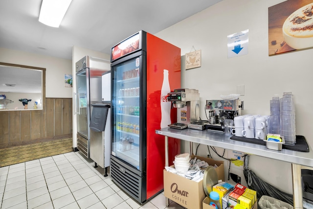 678 Colonel Ledyard Hwy, Ledyard, CT 06339 - kitchen featuring wood walls, a wainscoted wall, and tile patterned floors