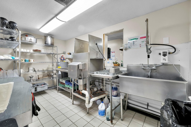 678 Colonel Ledyard Hwy, Ledyard, CT 06339 - kitchen with tile patterned flooring and a textured ceiling
