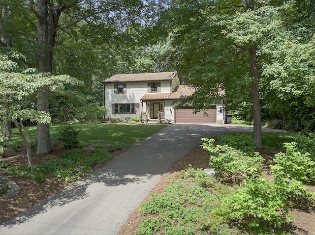 16 Eagle Ridge Dr, Ledyard, CT 06335 - view of front of property with driveway, a front yard, and a garage
