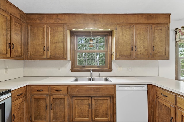16 Eagle Ridge Dr, Ledyard, CT 06335 - kitchen with dishwasher, light countertops, plenty of natural light, and brown cabinetry