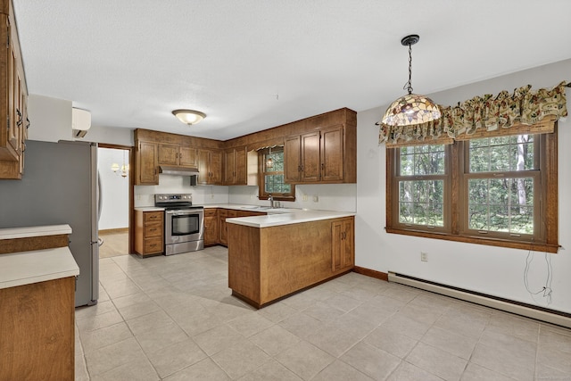 16 Eagle Ridge Dr, Ledyard, CT 06335 - kitchen with appliances with stainless steel finishes, a peninsula, a baseboard radiator, light countertops, and brown cabinetry