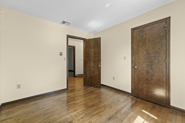 16 Eagle Ridge Dr, Ledyard, CT 06335 - unfurnished bedroom with wood finished floors and baseboards