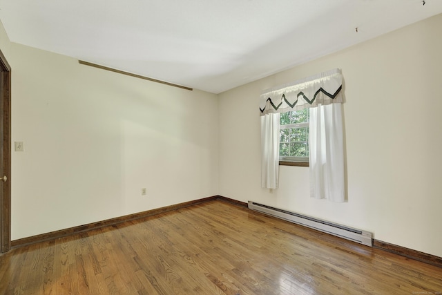 16 Eagle Ridge Dr, Ledyard, CT 06335 - unfurnished room featuring baseboard heating and wood finished floors