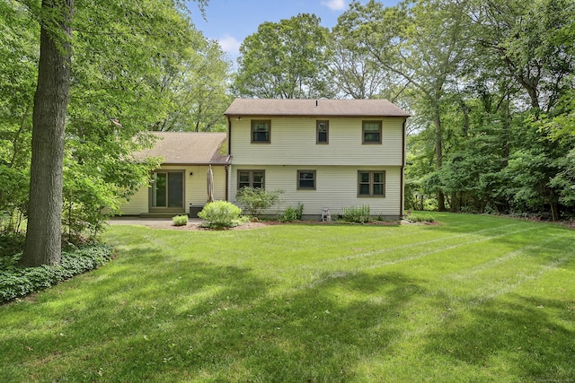 16 Eagle Ridge Dr, Ledyard, CT 06335 - back of property with a lawn