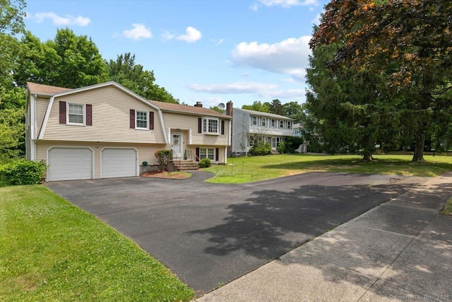 822 New Haven Ave, Milford, CT 06460 - split foyer home with driveway, an attached garage, a front yard, and a chimney