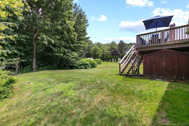 822 New Haven Ave, Milford, CT 06460 - view of green lawn with stairway and a deck