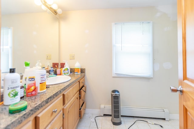 19 Main St, Plymouth, CT 06786 - bathroom with vanity, tile patterned floors, and baseboard heating