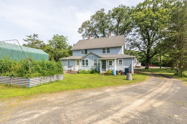 19 Main St, Plymouth, CT 06786 - view of front facade featuring a front lawn, a chimney, driveway, and a shingled roof