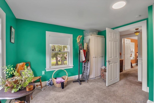 100 Adams Rd, Bloomfield, CT 06002 - living area featuring carpet and baseboards