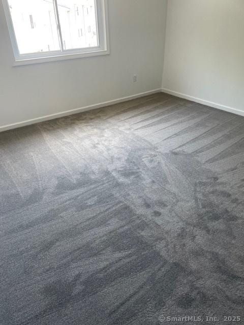 273 Derby Ave Unit 810, Derby, CT 06418 - empty room with dark colored carpet and baseboards