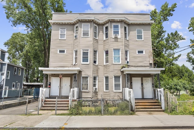 215 Rosette St, New Haven, CT 06519 - multi unit property featuring a fenced front yard and cooling unit