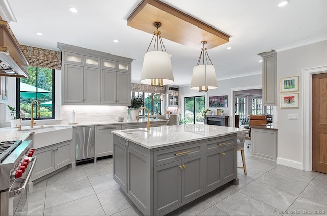 9 Tallwood Rd, Woodbridge, CT 06525 - kitchen featuring gray cabinets, high end stainless steel range, healthy amount of natural light, ornamental molding, and recessed lighting