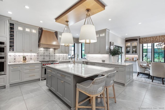 9 Tallwood Rd, Woodbridge, CT 06525 - kitchen featuring custom exhaust hood, gray cabinetry, high end stainless steel range oven, healthy amount of natural light, and recessed lighting