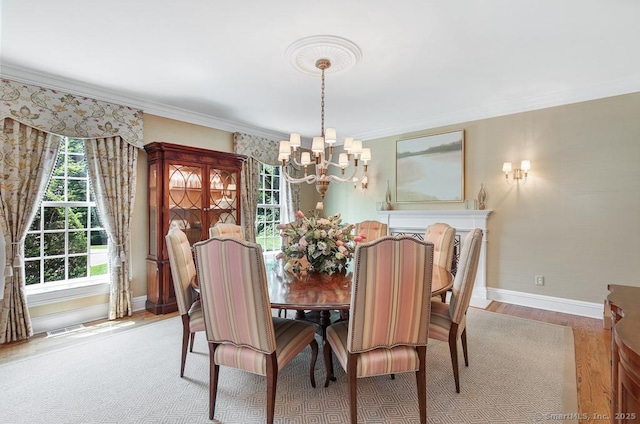 9 Tallwood Rd, Woodbridge, CT 06525 - dining room featuring a chandelier, wood finished floors, and ornamental molding