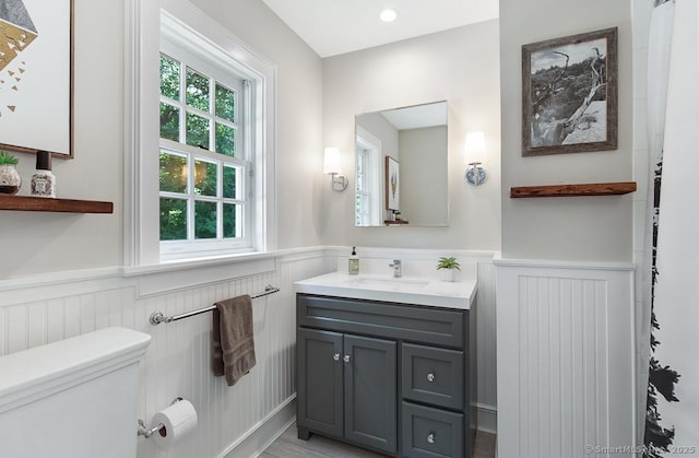 9 Tallwood Rd, Woodbridge, CT 06525 - full bathroom featuring a wainscoted wall, vanity, and a decorative wall