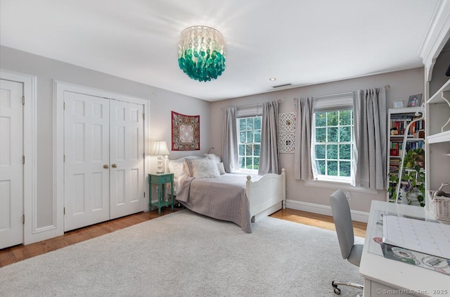 9 Tallwood Rd, Woodbridge, CT 06525 - bedroom with wood finished floors and a closet