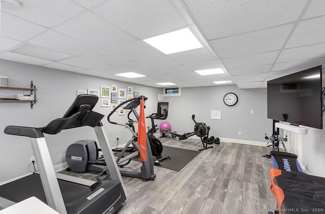 9 Tallwood Rd, Woodbridge, CT 06525 - gym with wood finished floors and a paneled ceiling