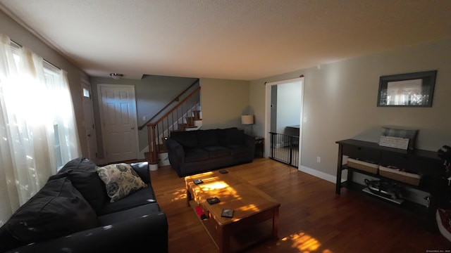 253 E Rd, East Windsor, CT 06016 - living room with wood finished floors and stairway