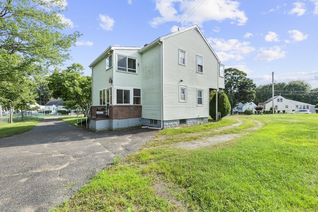 460 Stonybrook Rd, Stratford, CT 06614 - view of side of home featuring a lawn