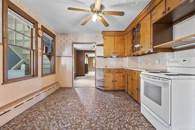 460 Stonybrook Rd, Stratford, CT 06614 - kitchen with white range with electric stovetop, open shelves, baseboard heating, ceiling fan, and tile walls