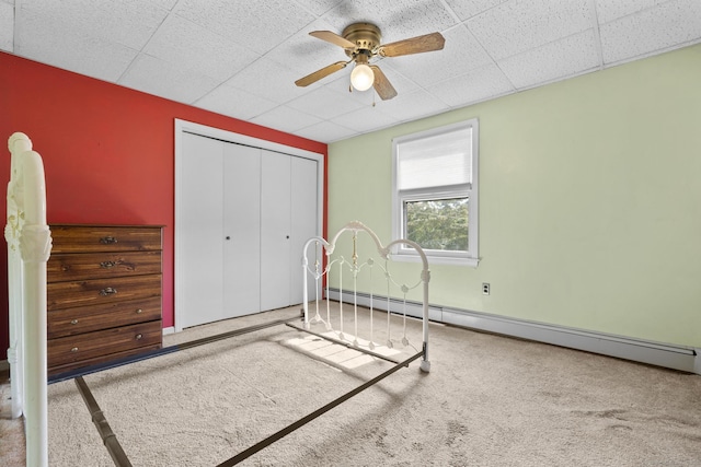460 Stonybrook Rd, Stratford, CT 06614 - bedroom with baseboard heating, a closet, carpet floors, a drop ceiling, and a ceiling fan