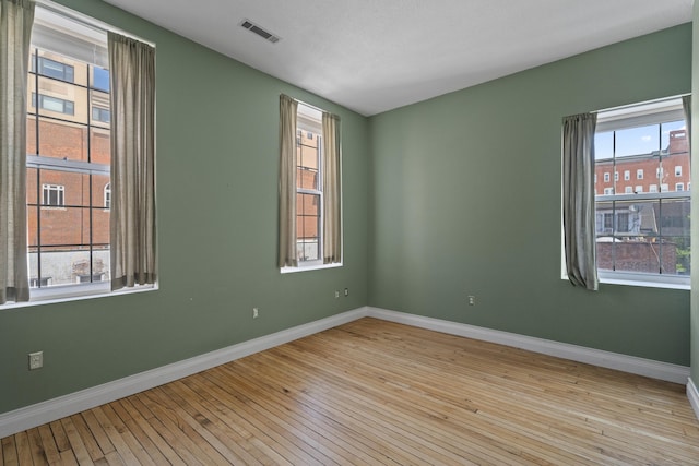 196 Crown St Unit 3J, New Haven, CT 06510 - spare room with hardwood / wood-style flooring and healthy amount of natural light