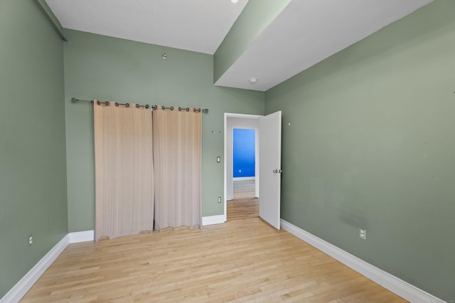 196 Crown St Unit 3J, New Haven, CT 06510 - unfurnished bedroom featuring baseboards and wood finished floors