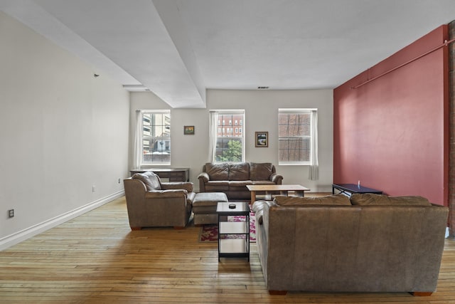 196 Crown St Unit 3J, New Haven, CT 06510 - living room featuring hardwood / wood-style flooring and baseboards