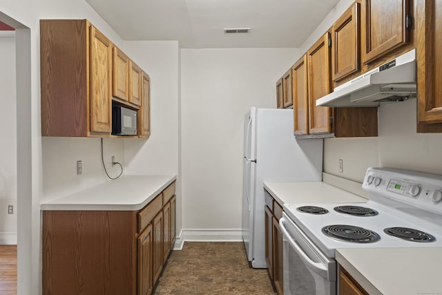 196 Crown St Unit 3J, New Haven, CT 06510 - kitchen featuring white range with electric stovetop, under cabinet range hood, light countertops, brown cabinetry, and black microwave