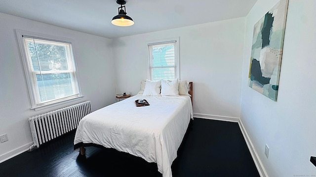 671 Fairview Ave, Bridgeport, CT 06606 - bedroom featuring radiator and dark wood-type flooring