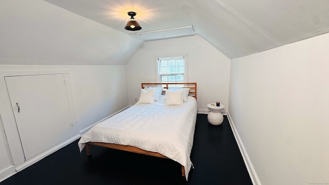 671 Fairview Ave, Bridgeport, CT 06606 - bedroom featuring vaulted ceiling and baseboards