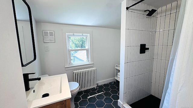 671 Fairview Ave, Bridgeport, CT 06606 - bathroom featuring radiator, tiled shower, vanity, and tile patterned flooring