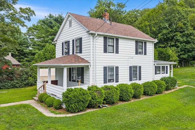 10 Gifford Ln, Norwich, CT 06389 - view of front of property featuring a front lawn, a chimney, roof with shingles, and covered porch